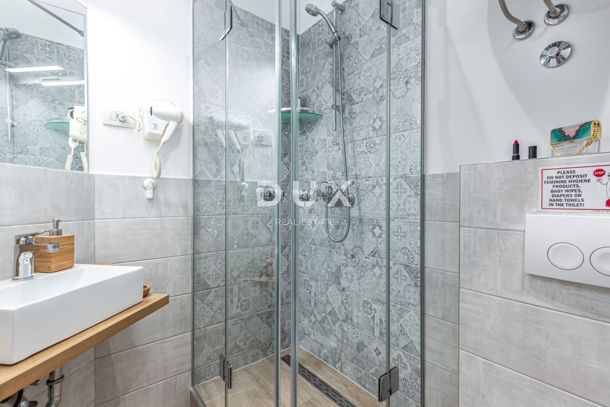 RIJEKA, CENTRO – Immobile d’investimento con tre appartamenti modernamente arredati