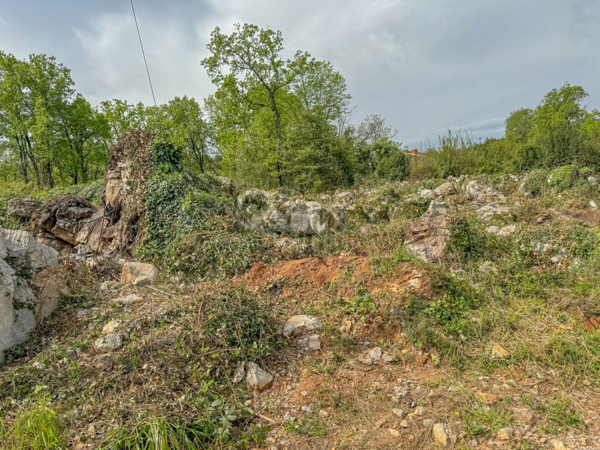 OPATIJA, IKA - terreno con permesso di costruzione nella zona M3, per un edificio con garage, terrazze e vista sul mare