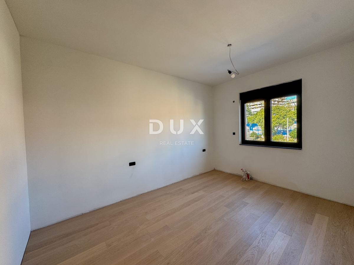 RIJEKA, KANTRIDA - Appartamento di 102 m2 in un lussuoso edificio di nuova costruzione a soli 250 metri dal mare con garage e vista panoramica sul mare