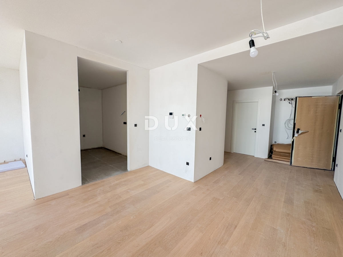 RIJEKA, KANTRIDA - Appartamento di 102 m2 in un lussuoso edificio di nuova costruzione a soli 250 metri dal mare con garage e vista panoramica sul mare