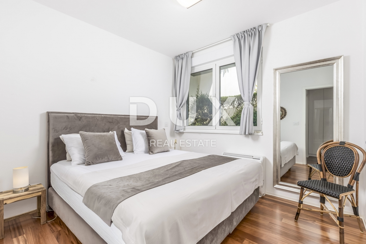 OPATIJA, IČIĆI - appartamento 79m2 con giardino in un edificio nuovo con piscina sul tetto, vista mare, parcheggio