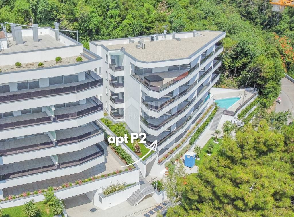 OPATIJA, CENTRO - spazioso appartamento in una nuova costruzione con vista mare, piscina in comune, garage 