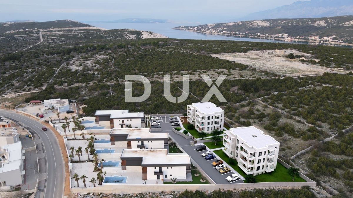 ISOLA DI PAG, NOVALJA - terreno con progetto per la costruzione di appartamenti