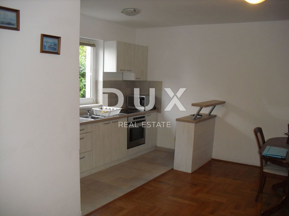 ISOLA DI KRK, MALINSKA - Appartamento 2 camere da letto + soggiorno con giardino e parcheggio