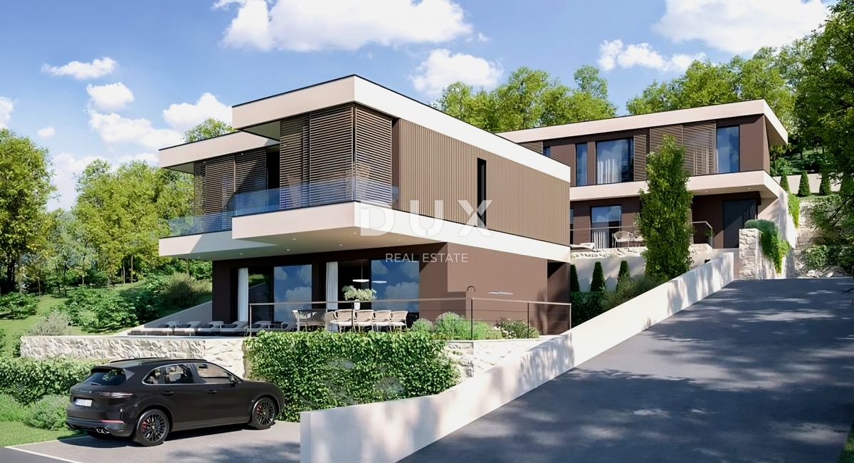 ISTRIA, RABAC - Due lotti di terreno con permessi di costruzione e vista mare