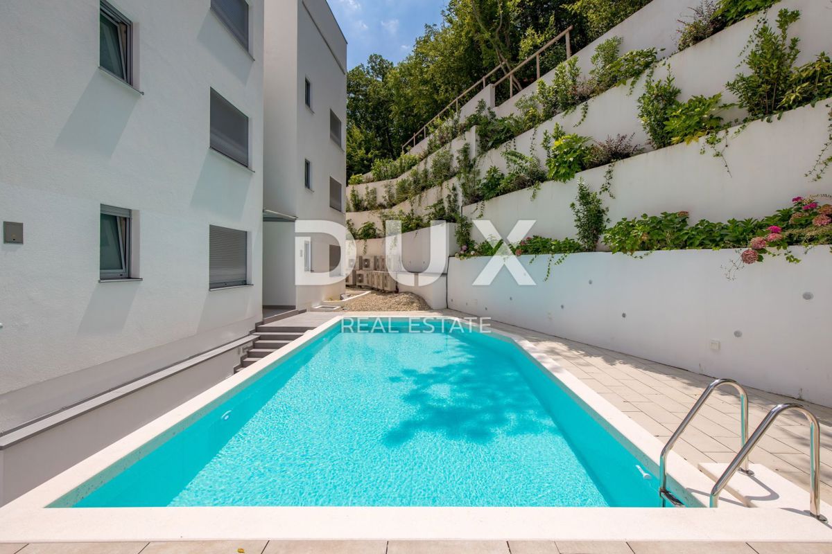 OPATIJA, CENTRO - OCCASIONE - appartamento esclusivo in un nuovo edificio con vista mare, piscina in comune, garage