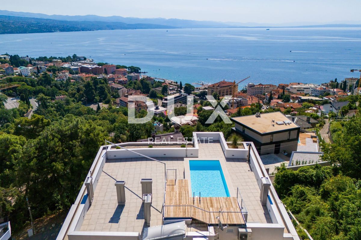 OPATIJA, CENTRO - OCCASIONE - appartamento esclusivo in un nuovo edificio con vista mare, piscina in comune, garage