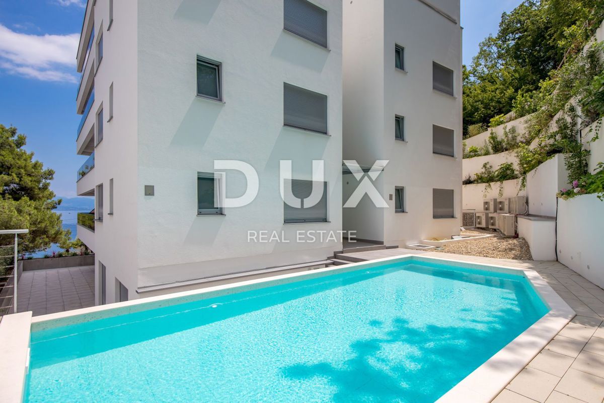 OPATIJA, CENTRO - OCCASIONE - appartamento esclusivo in un nuovo edificio con vista mare, piscina in comune, garage