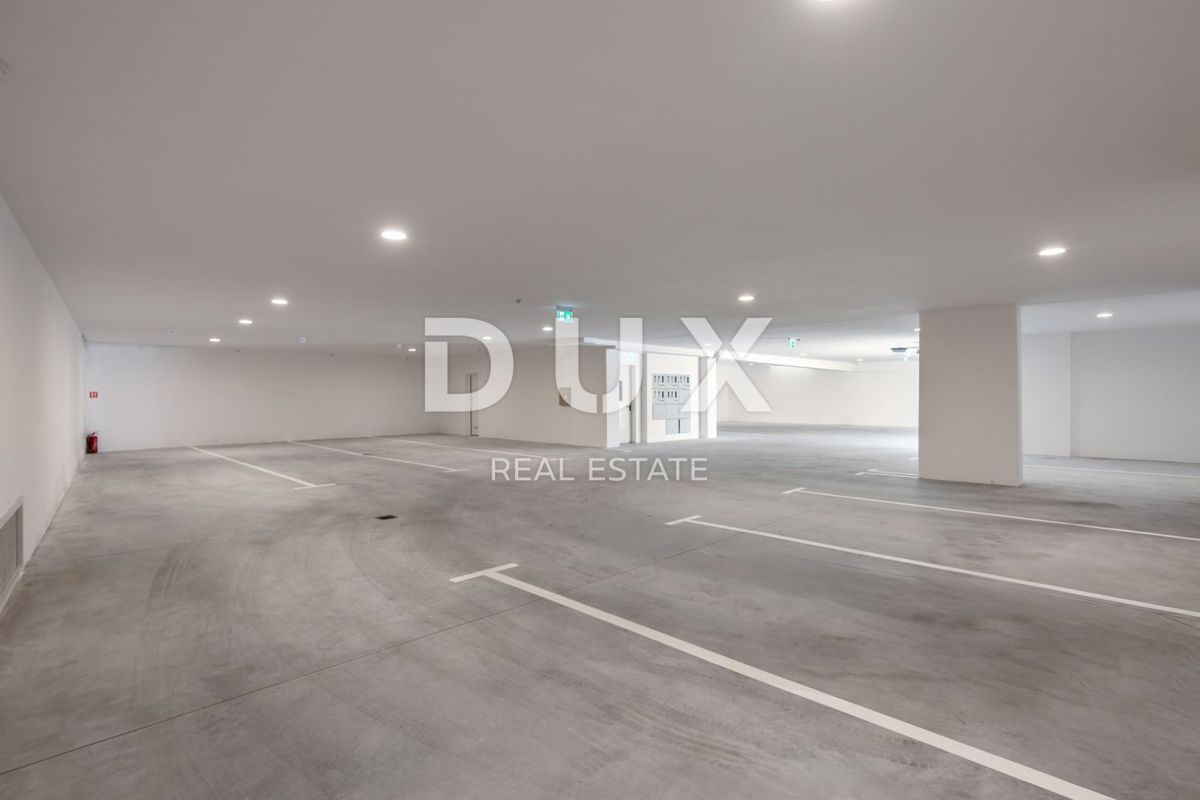 OPATIJA, CENTRO - OCCASIONE - appartamento esclusivo in un nuovo edificio con vista mare, piscina in comune, garage