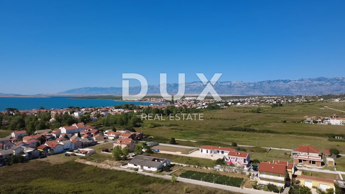 ZADAR, NIN - Terreno edificabile con permesso di costruzione per una casa bifamiliare!