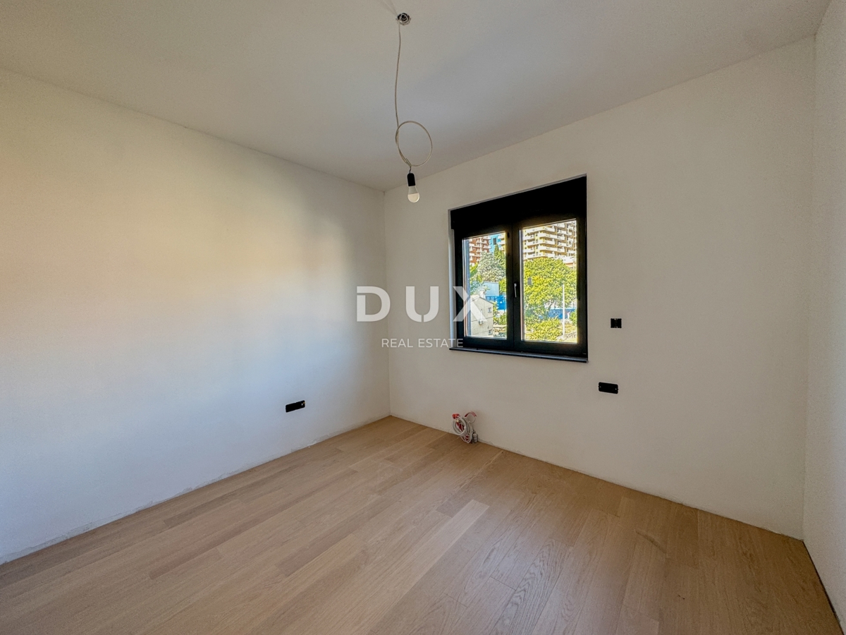 RIJEKA, KANTRIDA - Appartamento di 107 m2 in un lussuoso edificio di nuova costruzione a soli 250 metri dal mare con garage e vista panoramica sul mare