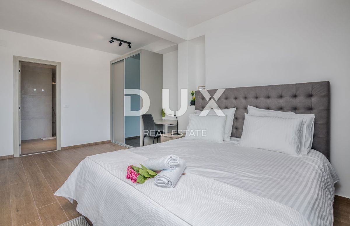 ABBAZIA – Moderna villa di lusso con due unità abitative e vista panoramica sul mare