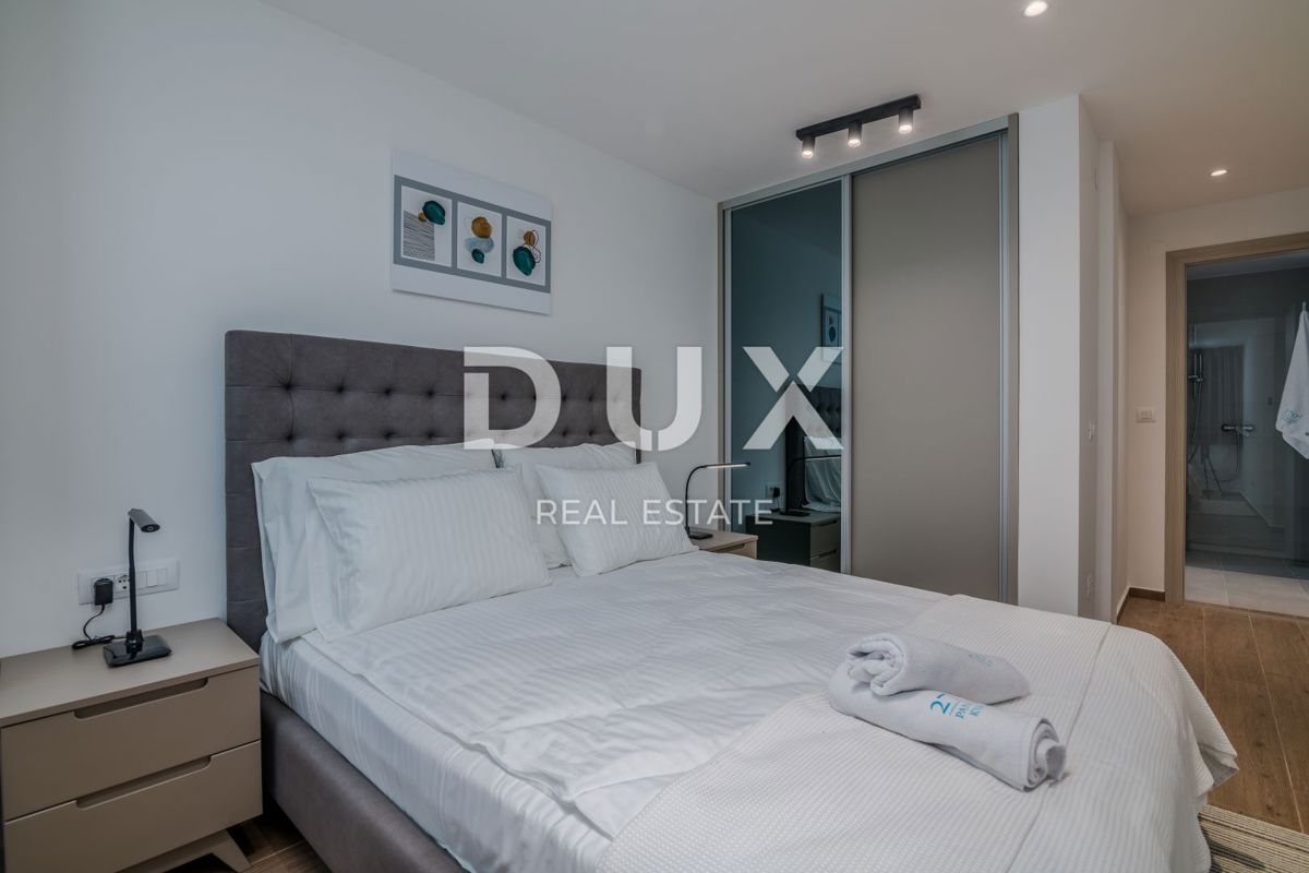 ABBAZIA – Moderna villa di lusso con due unità abitative e vista panoramica sul mare