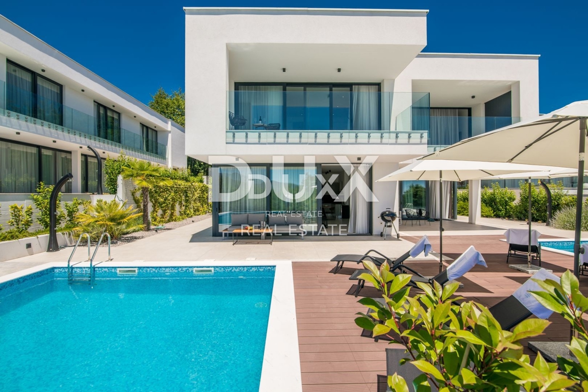 ABBAZIA – Moderna villa di lusso con due unità abitative e vista panoramica sul mare