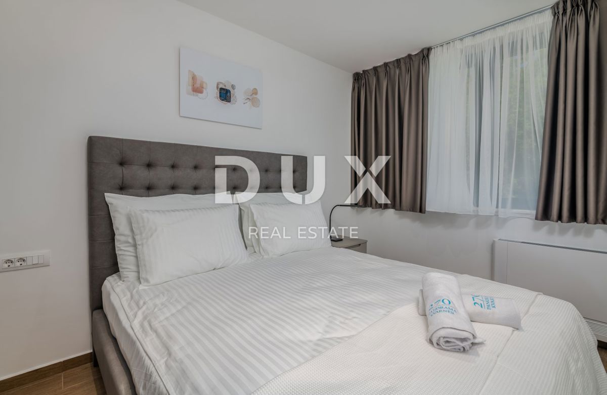 ABBAZIA – Moderna villa di lusso con due unità abitative e vista panoramica sul mare