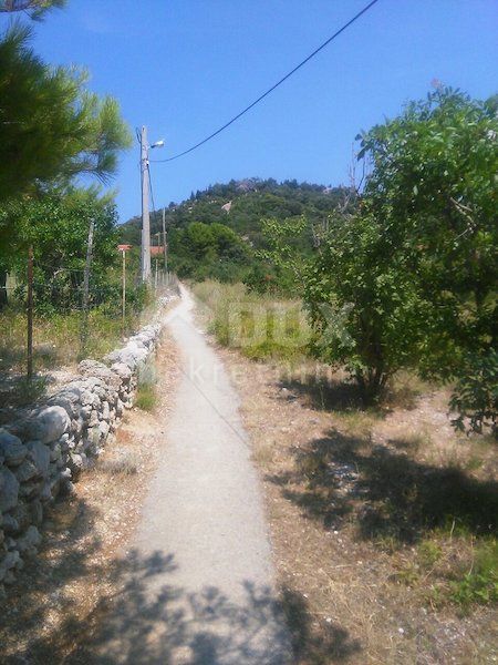 RAB, BARBAT - terreno edificabile 1426m2 con vista sul mare per un edificio residenziale - appartamenti - appartamenti / casa bifamiliare / casa in affitto - vacanze con piscina