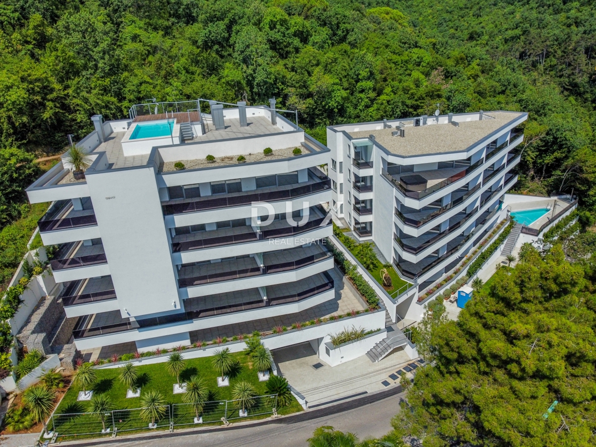 ABBAZIA, CENTRO - lussuoso edificio residenziale e commerciale con 7 appartamenti, garage e piscina nel centro di Abbazia