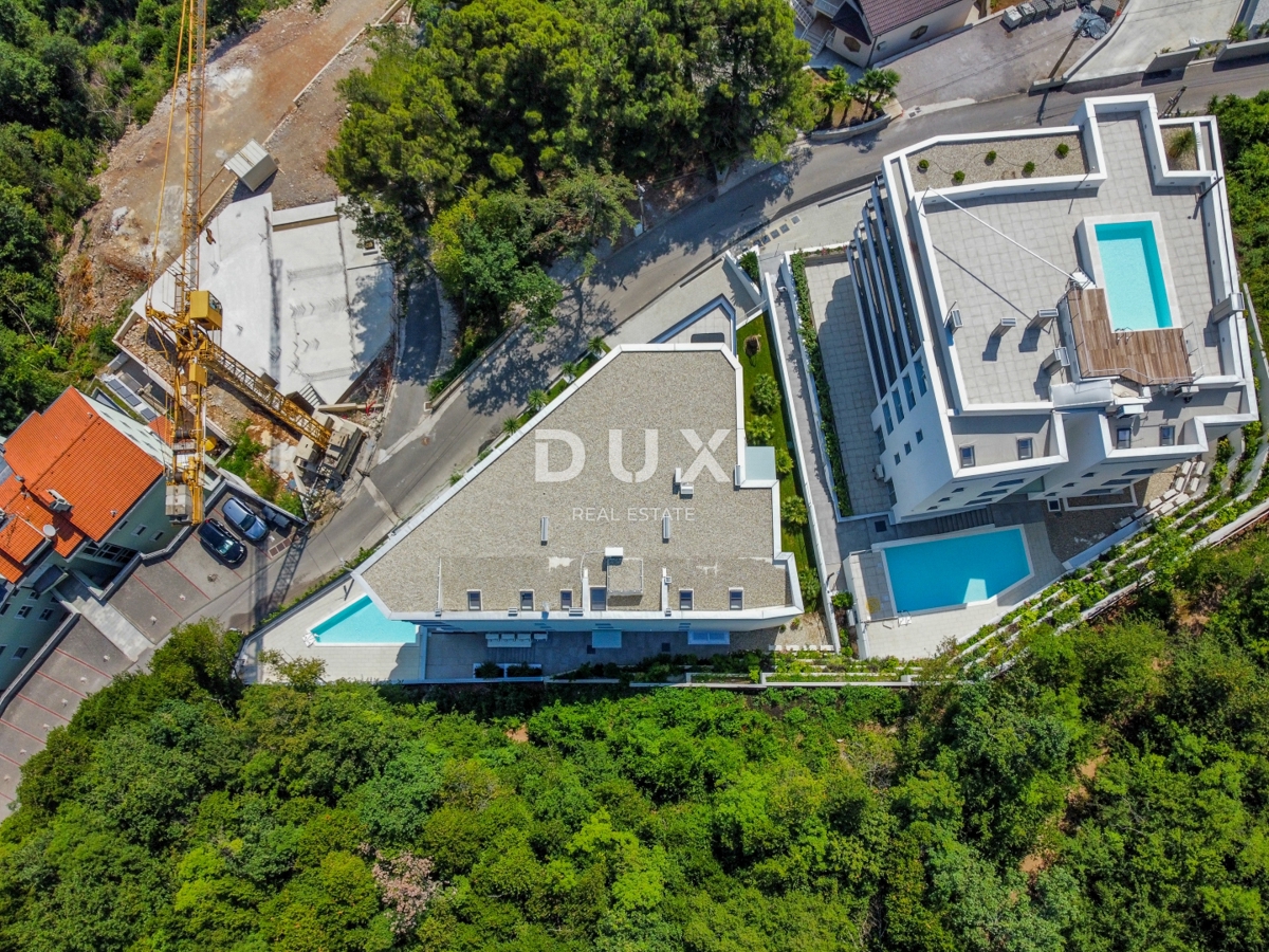 ABBAZIA, CENTRO - lussuoso edificio residenziale e commerciale con 7 appartamenti, garage e piscina nel centro di Abbazia