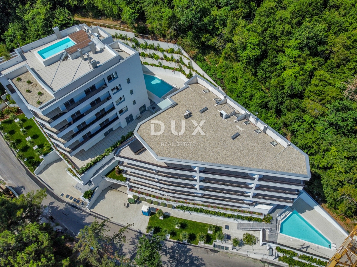 ABBAZIA, CENTRO - lussuoso edificio residenziale e commerciale con 7 appartamenti, garage e piscina nel centro di Abbazia