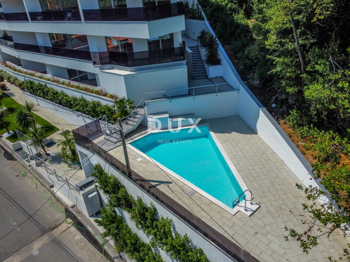 ABBAZIA, CENTRO - lussuoso edificio residenziale e commerciale con 7 appartamenti, garage e piscina nel centro di Abbazia