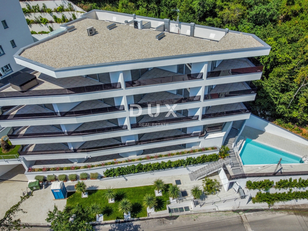 ABBAZIA, CENTRO - lussuoso edificio residenziale e commerciale con 7 appartamenti, garage e piscina nel centro di Abbazia