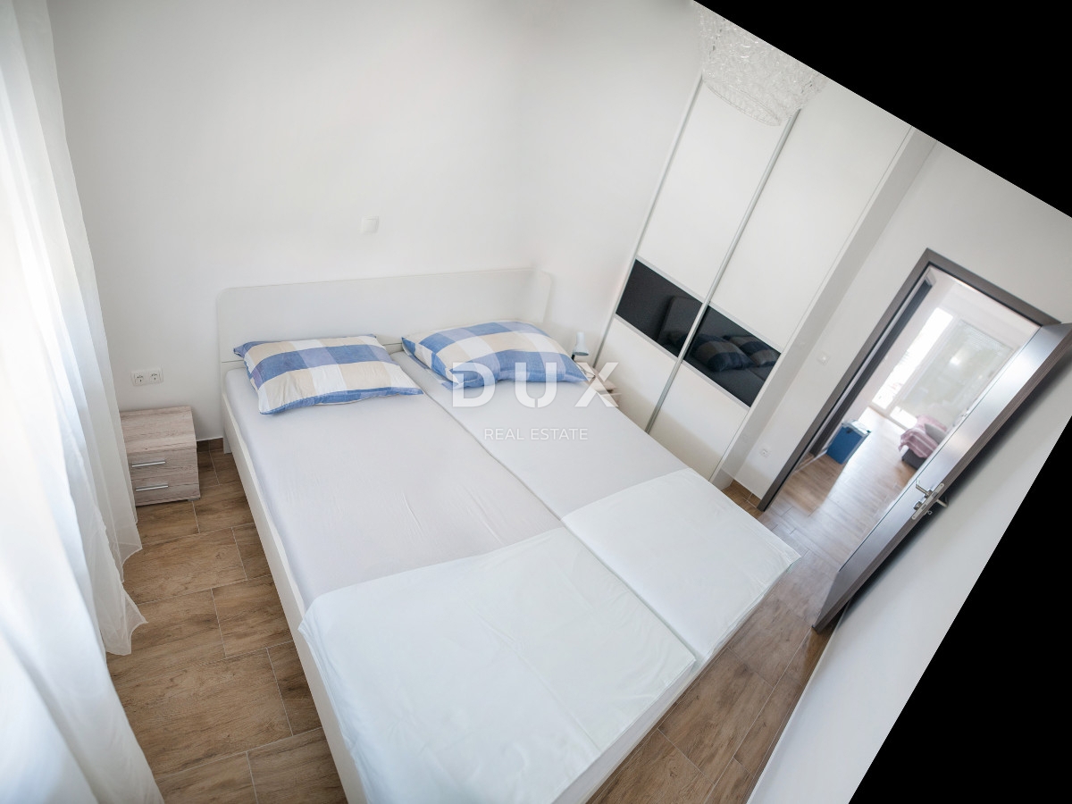 ZADAR, PAKOŠTANE - OCCASIONE! Appartamento con giardino e 3 posti auto!