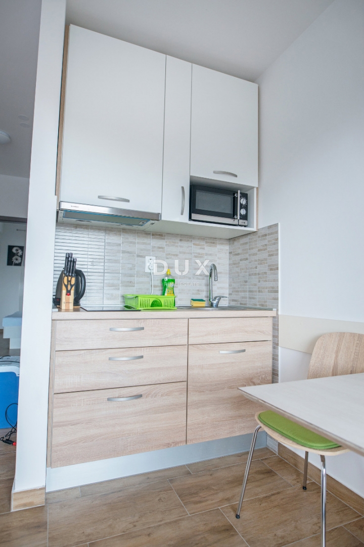 ZADAR, PAKOŠTANE - OCCASIONE! Appartamento con giardino e 3 posti auto!