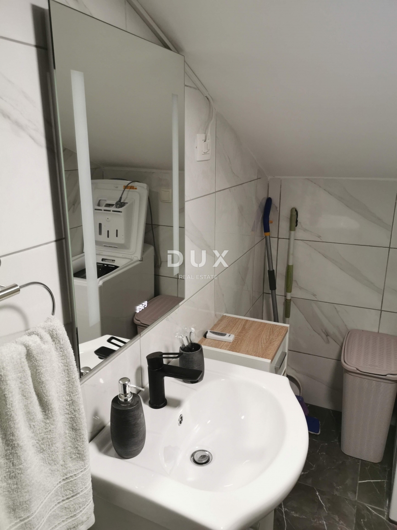 LOVRAN, CENTRO - appartamento nell'alto sottotetto di un'antica villa!