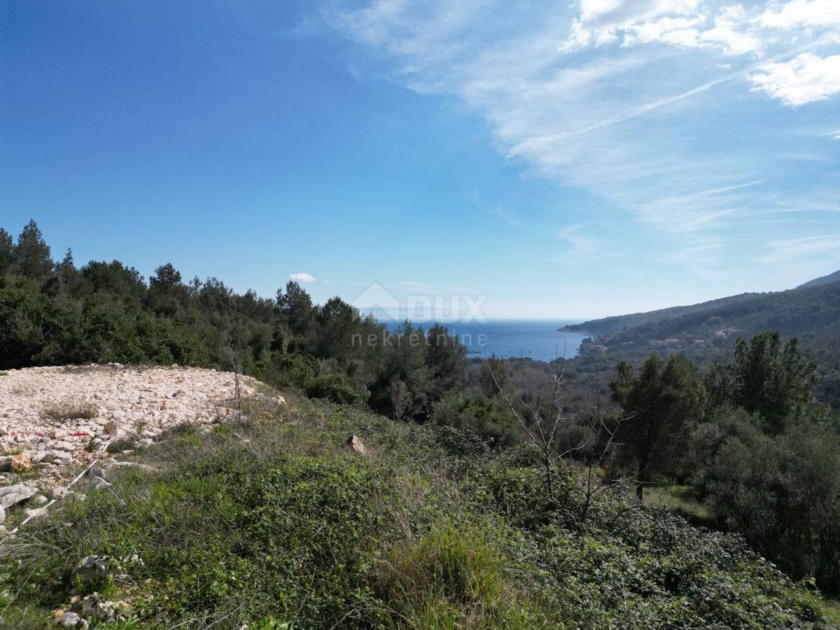 LABIN, SVETA MARINA- vecchia casa con terreno edificabile 435m2, con vista mare e progetto concettuale