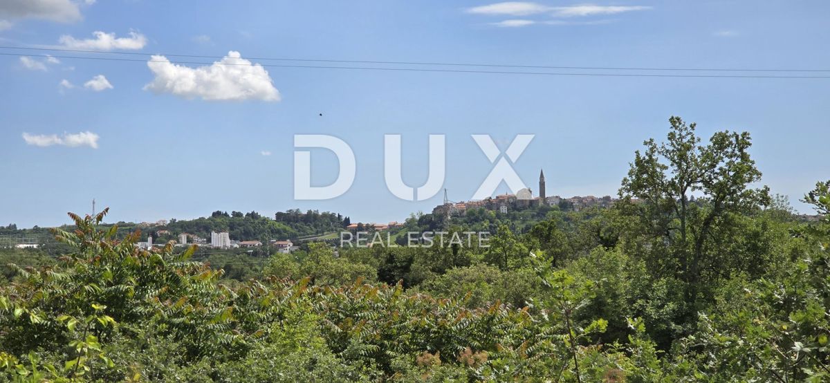 ISTRIA, BUJE - Terreno edificabile con permesso per una casa ad un piano con piscina, bellissima vista mare