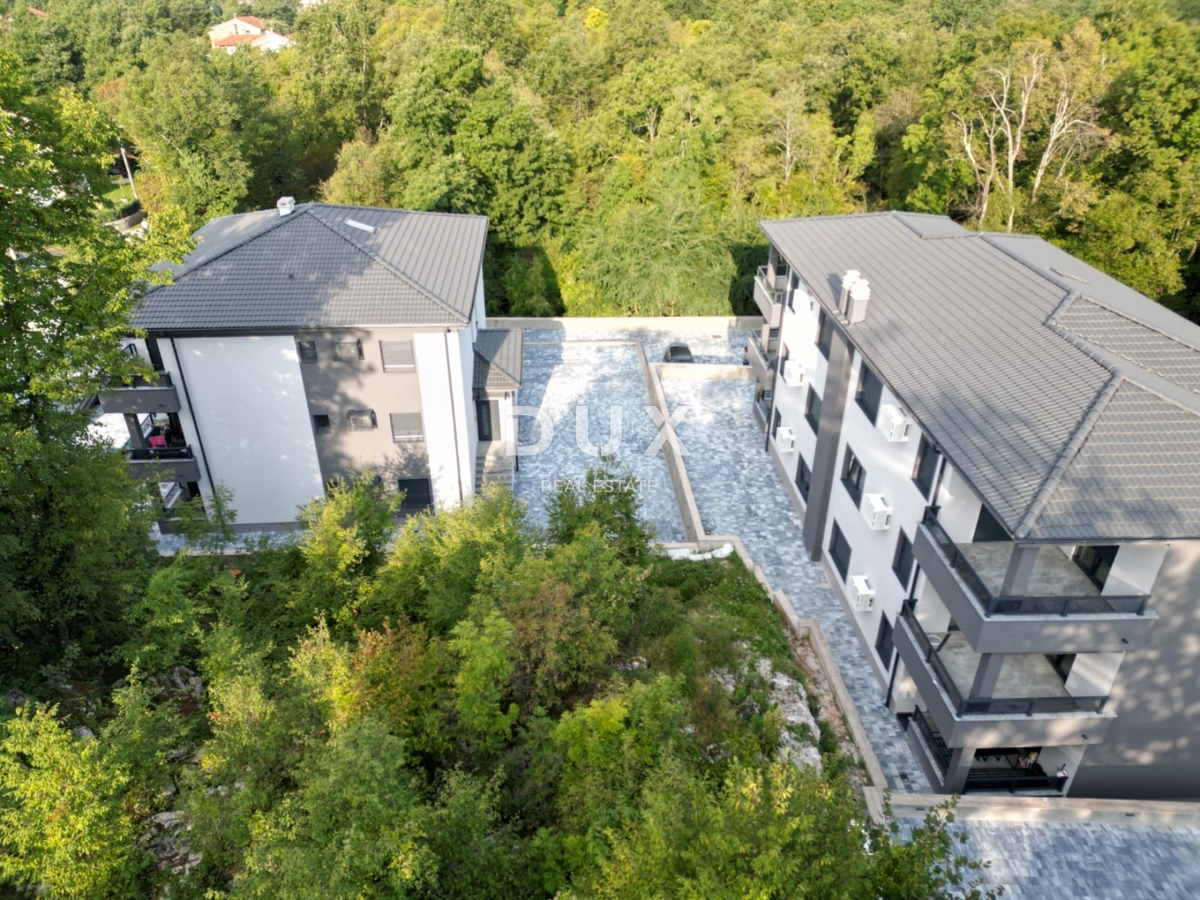 MATULJI, JUŠIĆI, JURDANI - appartamento 84m2 in un nuovo edificio con soggiorno + 2 camere da letto e giardino 