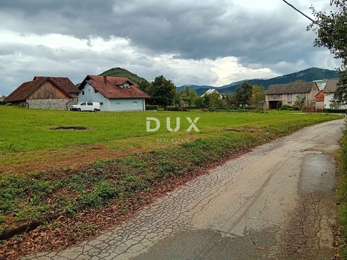 LIKA, OTOČAC, PROZOR - terreno edificabile di 2000 m2 vicino al fiume Gacka per condomini - appartamenti / case familiari / case in affitto con piscina 