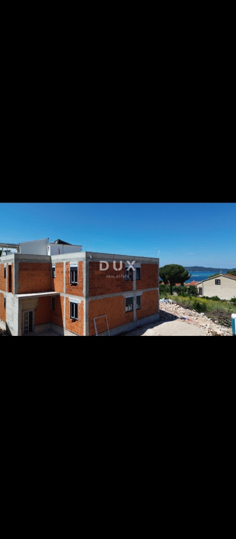 ŠIBENIK, BRODARICA - Appartamento in un nuovo edificio con giardino e vista mare!