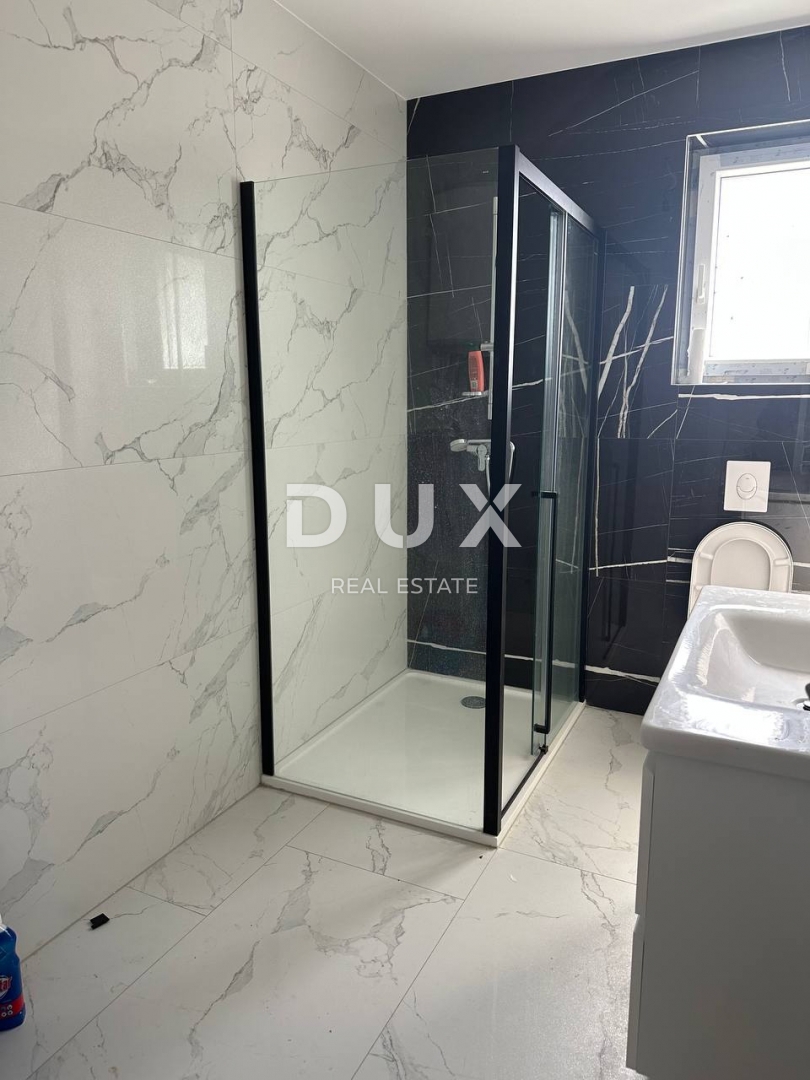 ISTRIA, NOVIGRAD - Appartamento in un nuovo edificio con vista mare