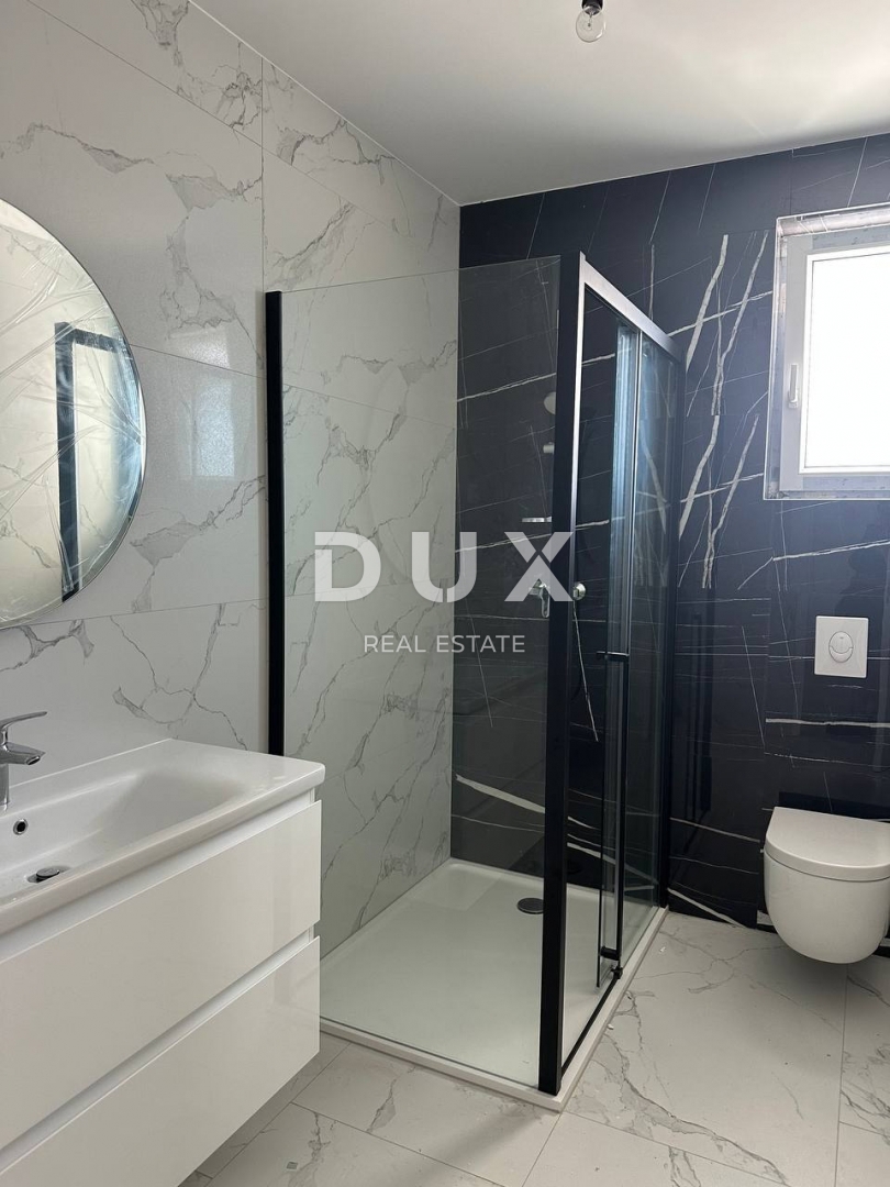 ISTRIA, NOVIGRAD - Appartamento in un nuovo edificio con vista mare