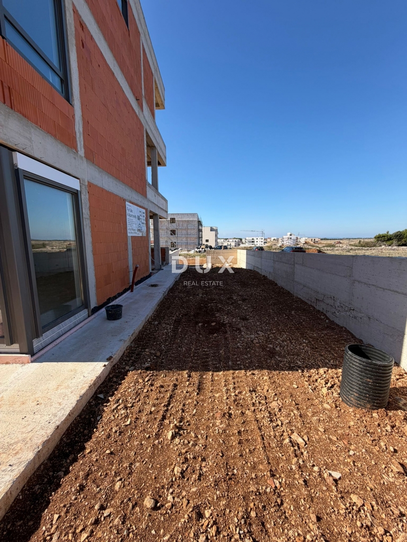 ISOLA DI PAG, POVLJANA - Appartamento con due camere da letto e giardino in un nuovo edificio