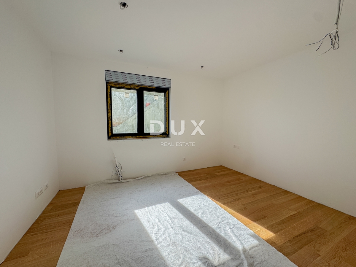 OPATIJA, CENTRO - un appartamento moderno in un nuovo edificio in una posizione privilegiata con garage, ampia terrazza e jacuzzi 