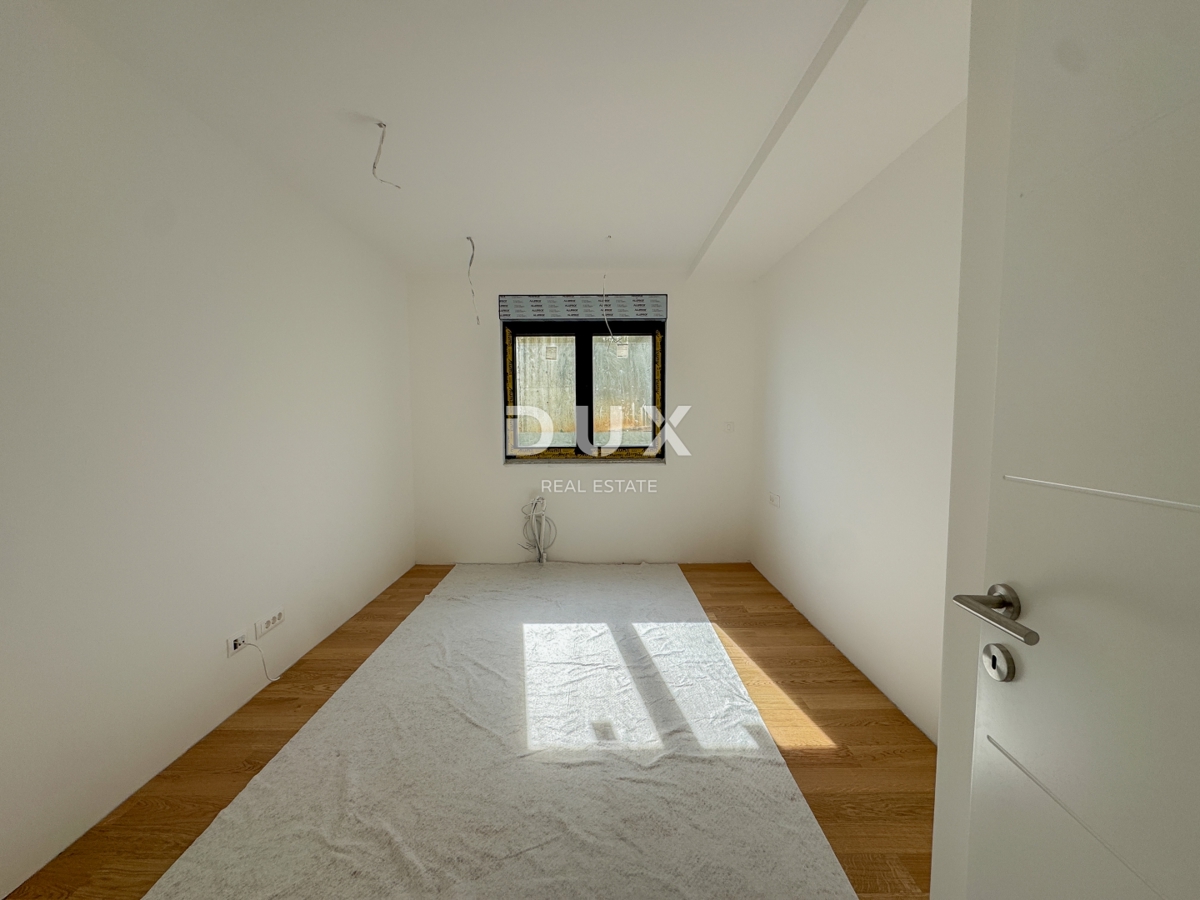 OPATIJA, CENTRO - un appartamento moderno in un nuovo edificio in una posizione privilegiata con garage, ampia terrazza e jacuzzi 