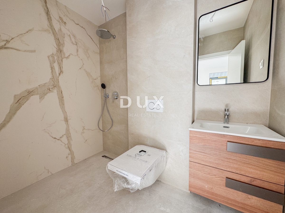 OPATIJA, CENTRO - un appartamento moderno in un nuovo edificio in una posizione privilegiata con garage, ampia terrazza e jacuzzi 