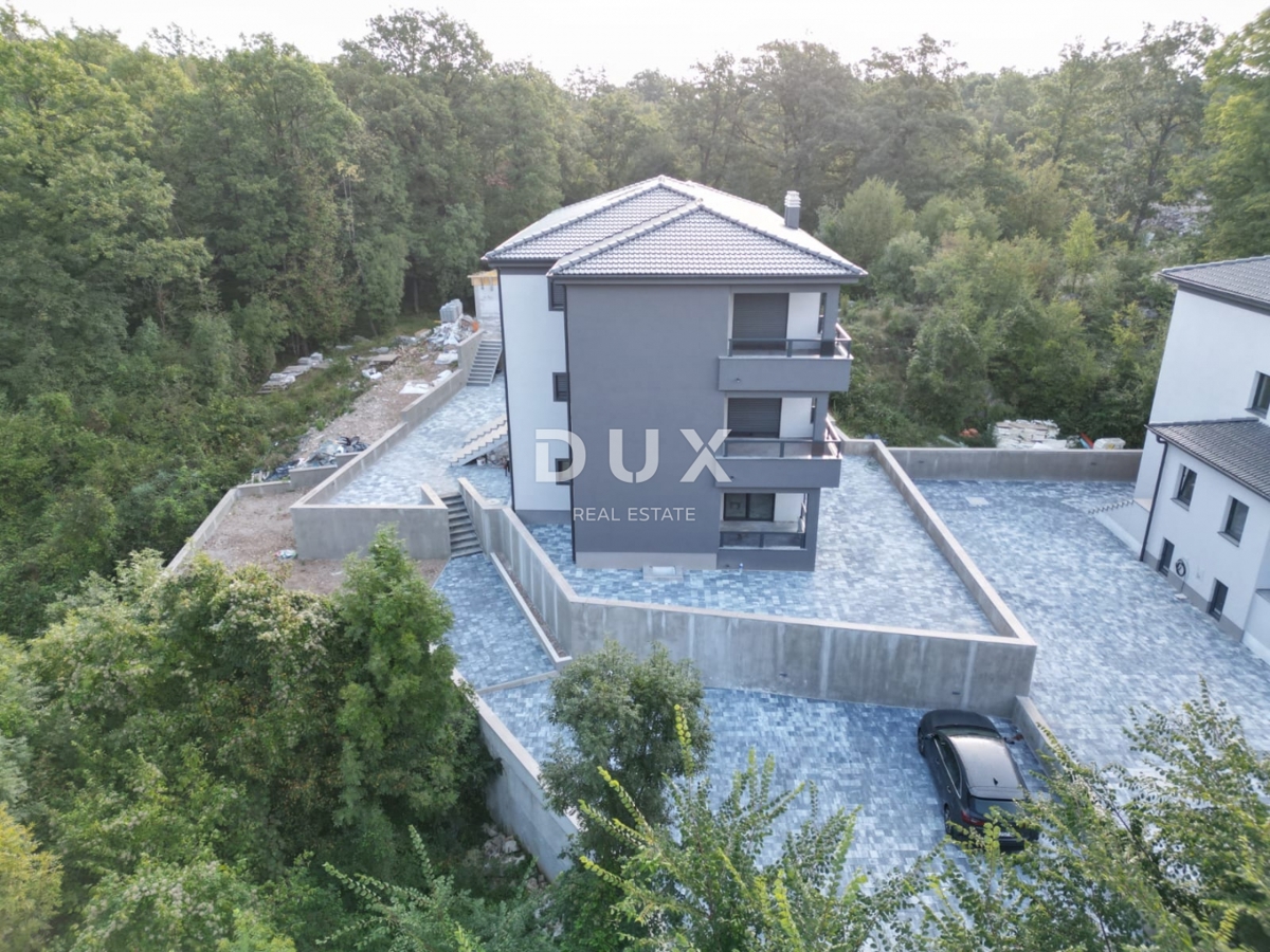 MATULJI, JUŠIĆI, JURDANI - appartamento al 2° piano 87,74 m2 in un nuovo edificio DB+2S con giardino 