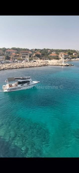 Trogir-Dintorni, Drvenik Mali, terreno edificabile 1052m2, a 150m dal mare