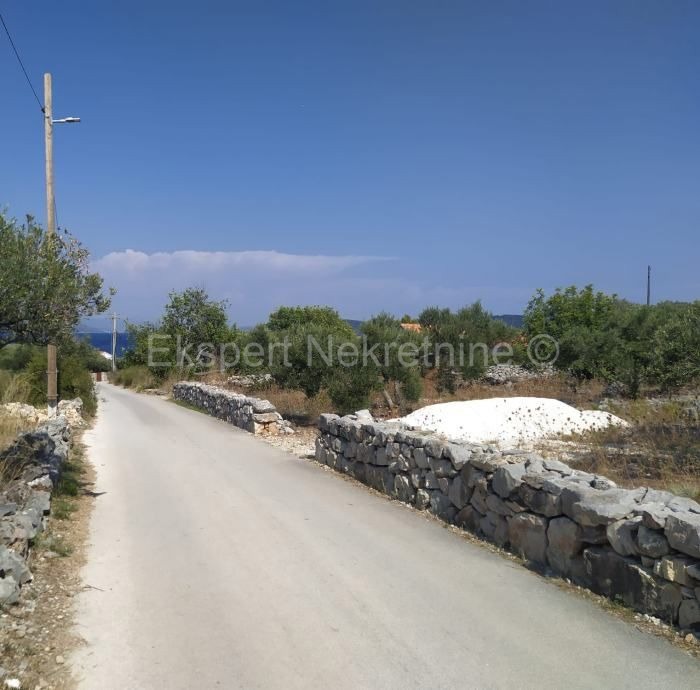 Trogir-Dintorni, Drvenik Mali, terreno edificabile 1052m2, a 150m dal mare