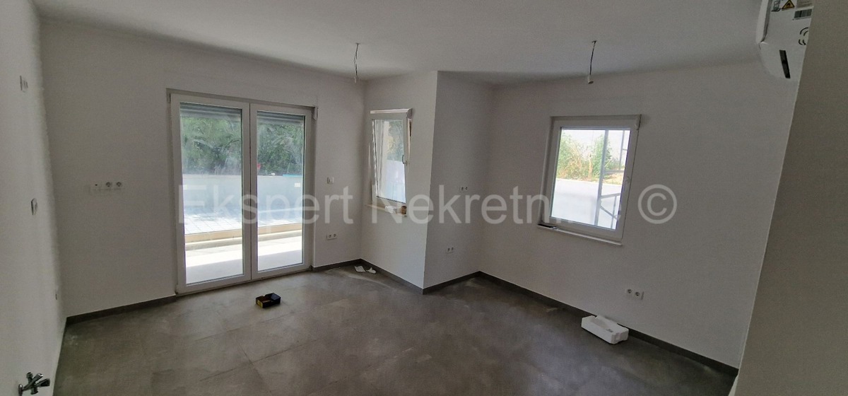 Čiovo, Okrug G., 1 bedroom apartment 58m2, garden, large terrace, New construction
