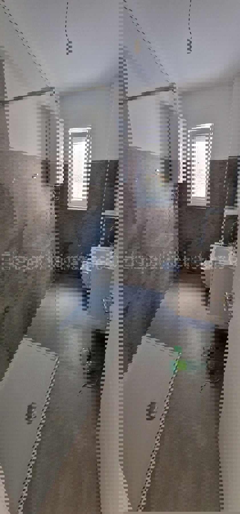 Čiovo, Okrug G., 1 bedroom apartment 58m2, garden, large terrace, New construction