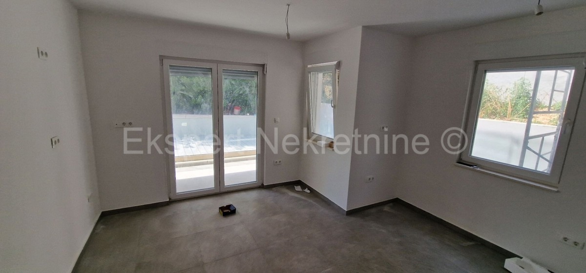 Čiovo, Okrug G., 1 bedroom apartment 58m2, garden, large terrace, New construction