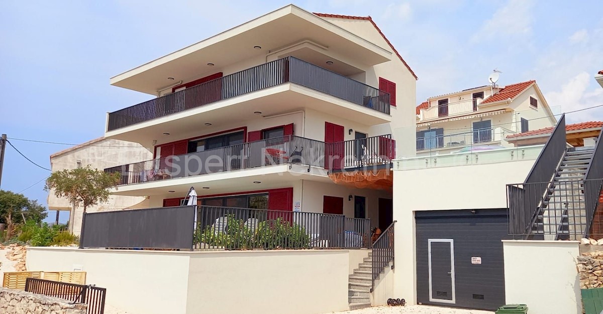 Seget Vranjica, apartment house with 4 apartments. and two swimming pools, 60 m from the sea