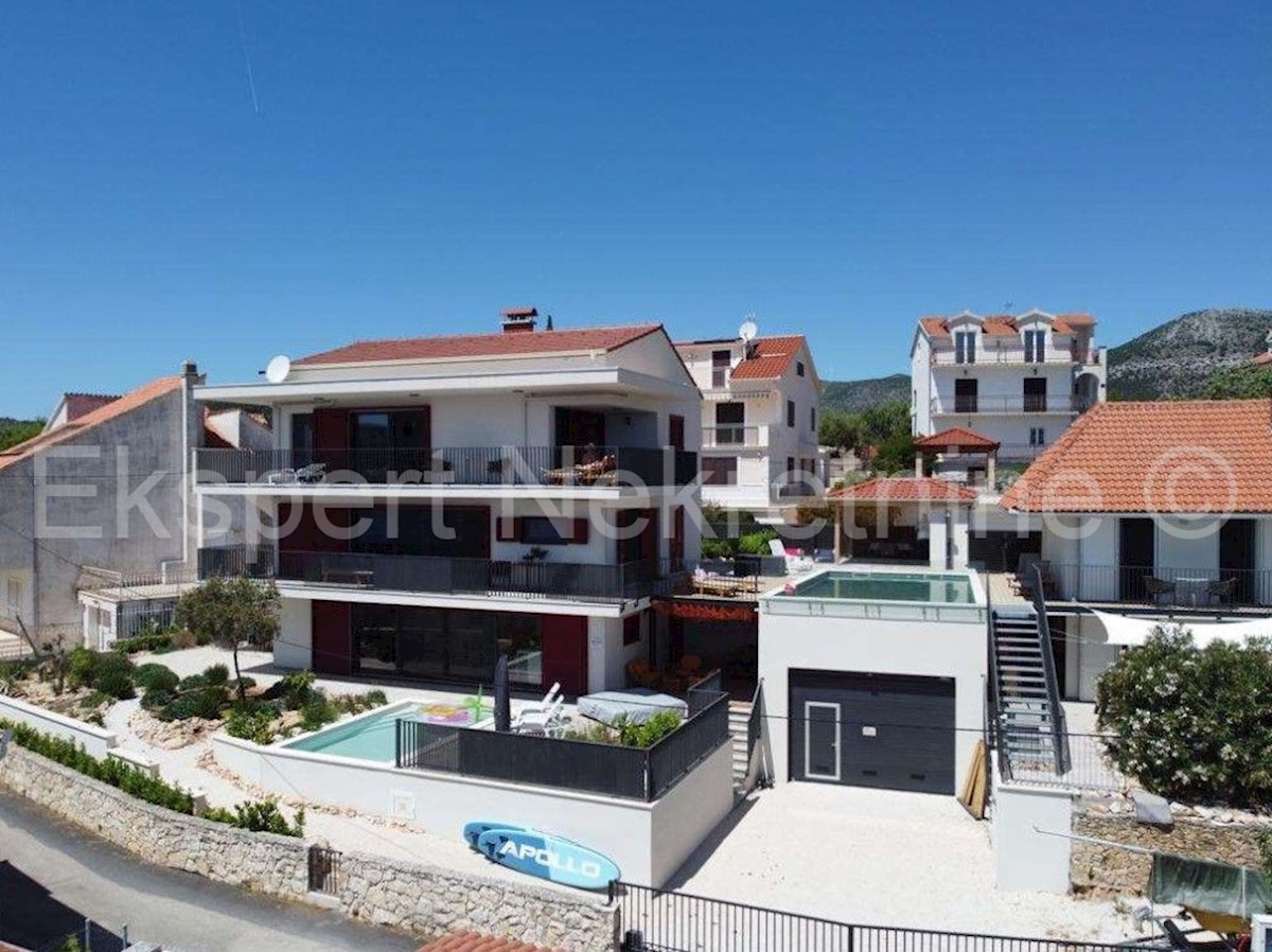 Seget Vranjica, apartment house with 4 apartments. and two swimming pools, 60 m from the sea