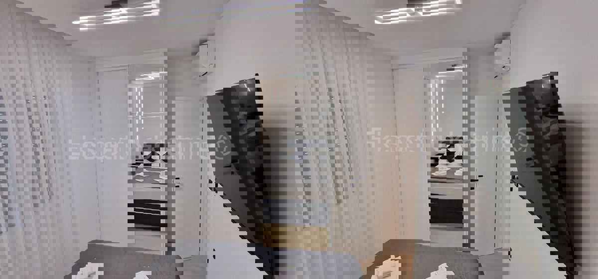 Seget D., 2-bedroom apartment 69m2 + garden 99 m2, new building, furnished, parking