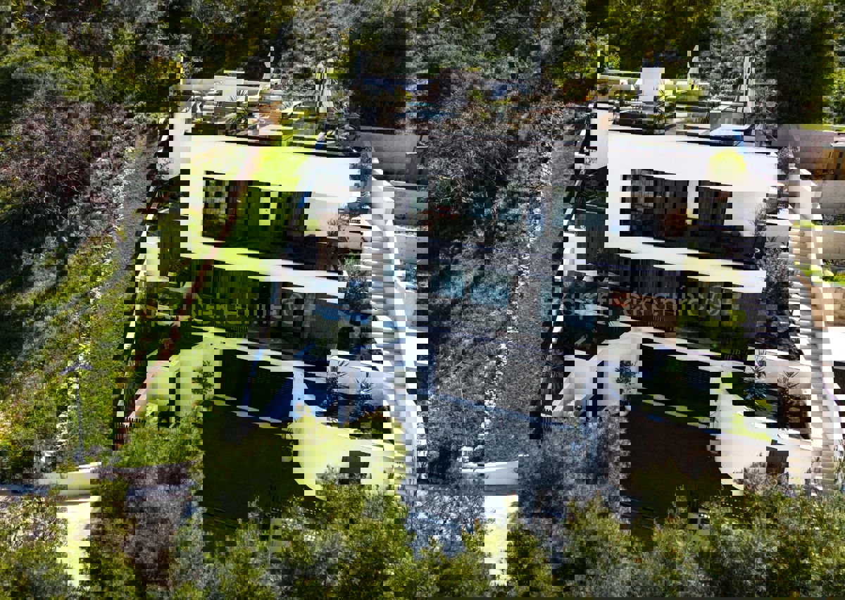 Trogir, luxury villa 312 m2, with swimming pool and garage and landscaped garden