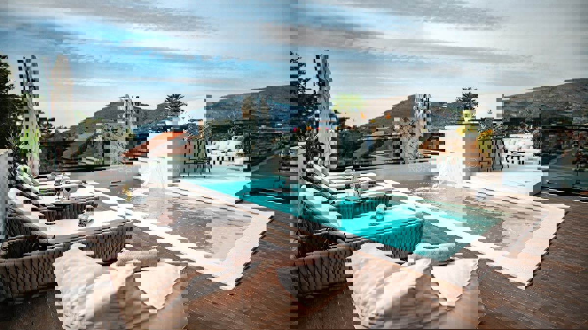 Trogir, luxury villa 312 m2, with swimming pool and garage and landscaped garden